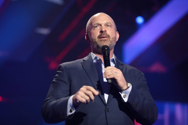 Kevin Roberts speaking with attendees at the 2022 AmericaFest at the Phoenix Convention Center in Phoenix, Arizona.